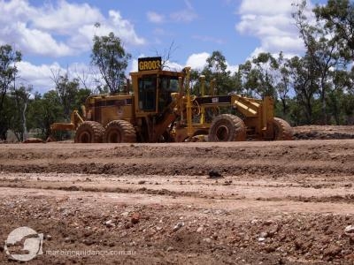 CAT 16H grader with dual-mast GPS. Perfect for bulk earthworks.