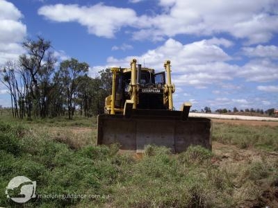 A single GPS receiver uses sensors to detect machine blade slope.