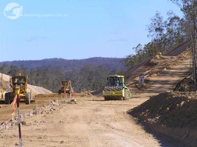 Lasers guided Graders are used for pavement trimming.