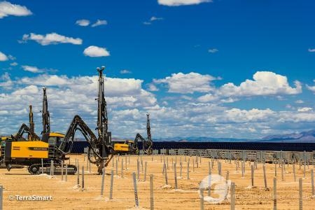 Atlas Copco Rock drills equipped with the full Trimble DPS900 Drilling System helps contractor improve the speed and accuracy of building 1000-acre solar project